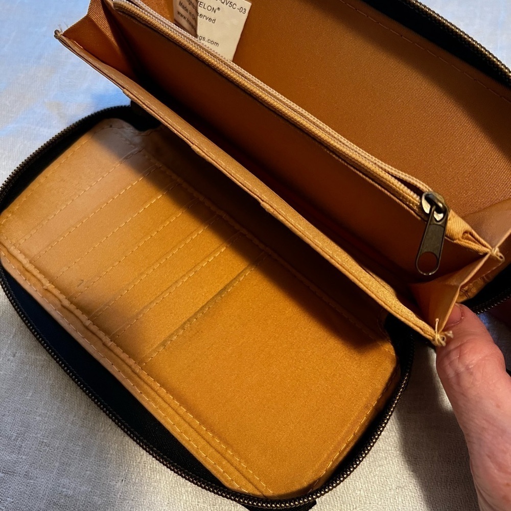 Travelon wallet in black. Zipper close. Wristlet strap. Great for travel. - Picture 4 of 6